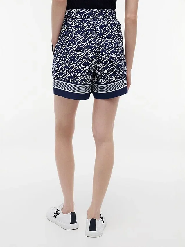 Pantalones cortos de voile con monograma en letra cursiva Pantalones cortos de voile con monograma en letra cursiva