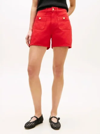 Pantalones cortos vaqueros con bolsillo y botón dorado