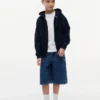 Pantalones cortos vaqueros holgados con estampado de grafitis para niño Pantalones cortos vaqueros holgados con estampado de grafitis para niño