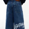 Pantalones cortos vaqueros holgados con estampado de grafitis para niño Pantalones cortos vaqueros holgados con estampado de grafitis para niño