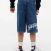 Pantalones cortos vaqueros holgados con estampado de grafitis para niño Pantalones cortos vaqueros holgados con estampado de grafitis para niño