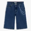 Pantalones cortos vaqueros holgados con estampado de grafitis para niño Pantalones cortos vaqueros holgados con estampado de grafitis para niño