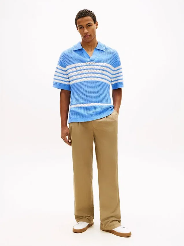 Pantalones holgados con pliegues y tacto de papel Pantalones holgados con pliegues y tacto de papel