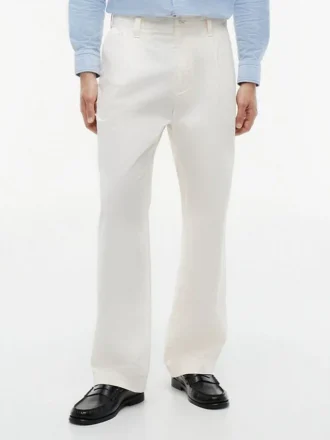Pantalones holgados con pliegues y tacto de papel Pantalones holgados con pliegues y tacto de papel