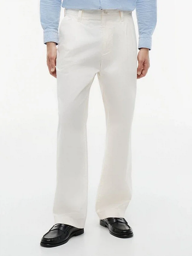 Pantalones holgados con pliegues y tacto de papel Pantalones holgados con pliegues y tacto de papel