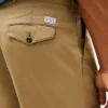 Pantalones holgados con pliegues y tacto de papel Pantalones holgados con pliegues y tacto de papel