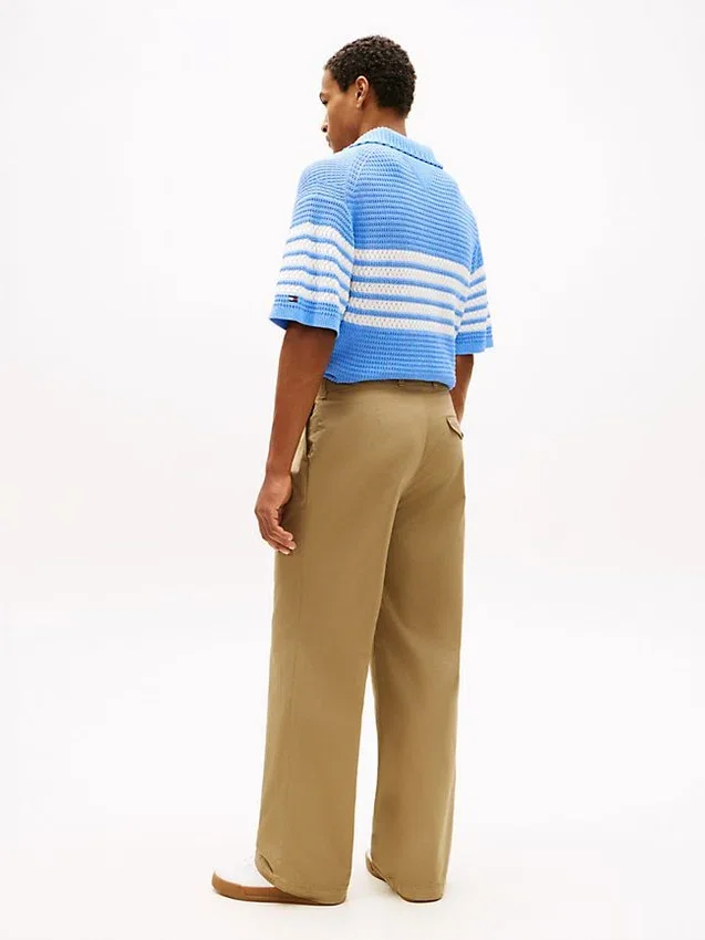 Pantalones holgados con pliegues y tacto de papel Pantalones holgados con pliegues y tacto de papel