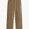 Pantalones holgados con pliegues y tacto de papel Pantalones holgados con pliegues y tacto de papel
