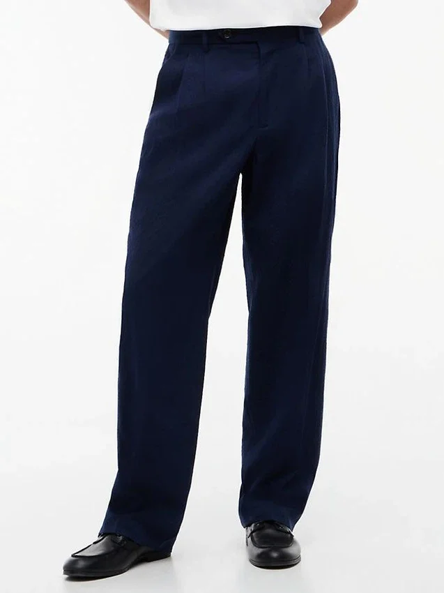 Pantalones holgados de mezcla de lana con tejido seersucker Pantalones holgados de mezcla de lana con tejido seersucker