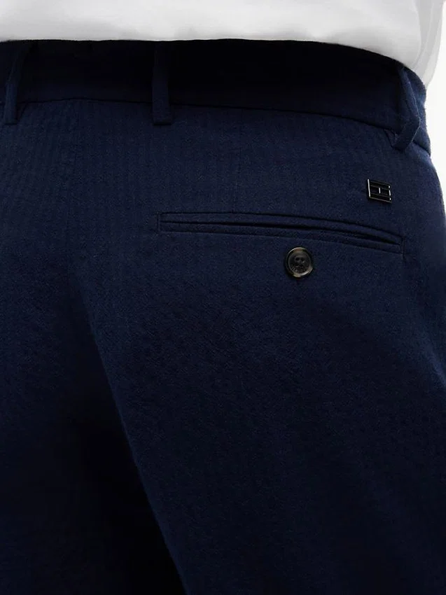 Pantalones holgados de mezcla de lana con tejido seersucker Pantalones holgados de mezcla de lana con tejido seersucker