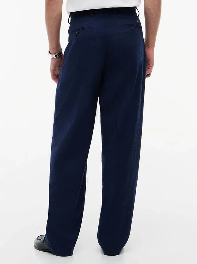 Pantalones holgados de mezcla de lana con tejido seersucker Pantalones holgados de mezcla de lana con tejido seersucker
