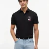 Polo con el logotipo del equipo Tommy x Cadillac F1® Team Polo con el logotipo del equipo Tommy x Cadillac F1® Team