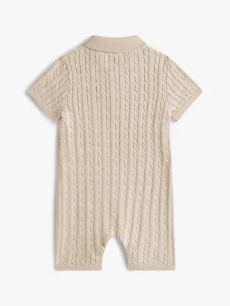 Polo con tirantes de punto trenzado para bebés Polo con tirantes de punto trenzado para bebés