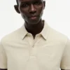 Polo Crest teñido en prenda, corte regular