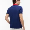 Polo de ajuste regular con logo Hilfiger y tejido transpirable