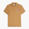 Polo de algodón liso con bandera ondulada y corte regular