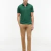 Polo de algodón liso con cremallera de corte regular