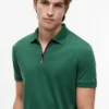 Polo de algodón liso con cremallera de corte regular