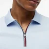 Polo de algodón liso con cremallera de corte regular