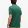 Polo de algodón liso con cremallera de corte regular