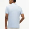 Polo de algodón liso con cremallera de corte regular