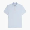 Polo de algodón liso con cremallera de corte regular