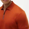 Polo de algodón liso con cremallera y corte regular