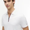 Polo de algodón liso con cremallera y corte regular