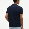 Polo de algodón liso con cremallera y corte regular