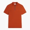 Polo de algodón liso con cremallera y corte regular