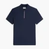 Polo de algodón liso con cremallera y corte regular