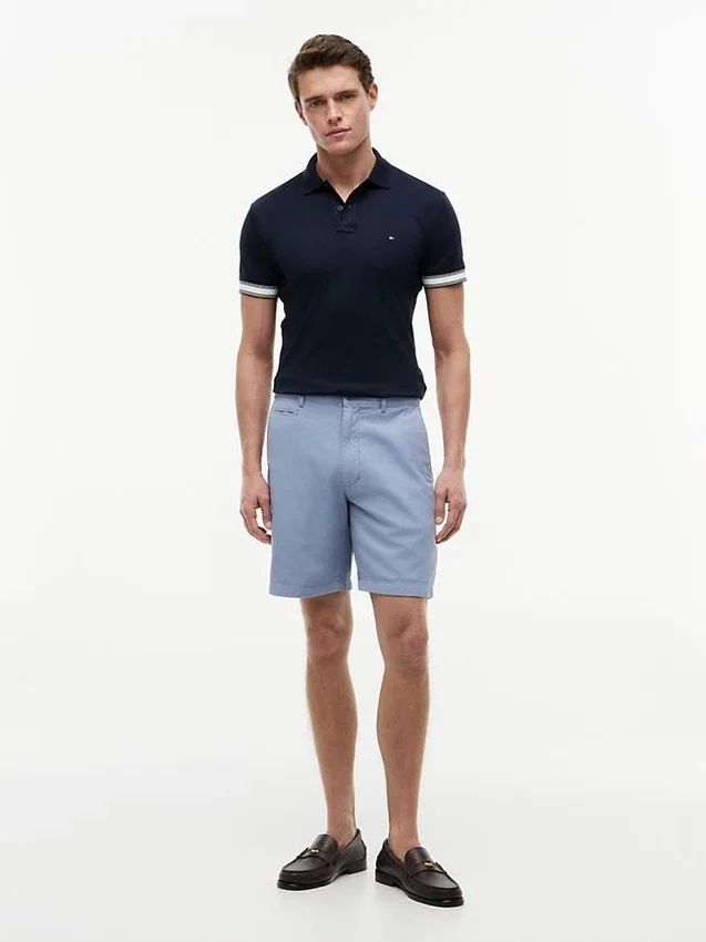 Polo de algodón liso de corte ajustado Polo de algodón liso de corte ajustado