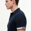 Polo de algodón liso de corte ajustado Polo de algodón liso de corte ajustado