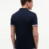 Polo de algodón liso de corte ajustado Polo de algodón liso de corte ajustado