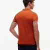 Polo de algodón liso de corte entallado
