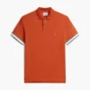 Polo de algodón liso de corte entallado