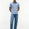 Polo de algodón liso de corte regular Polo de algodón liso de corte regular