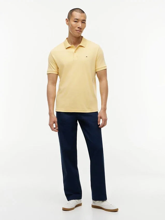 Polo de algodón liso de corte regular Polo de algodón liso de corte regular