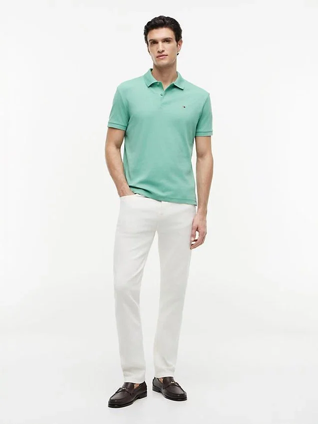 Polo de algodón liso de corte regular Polo de algodón liso de corte regular