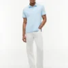 Polo de algodón liso de corte regular Polo de algodón liso de corte regular