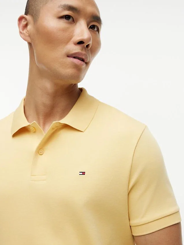 Polo de algodón liso de corte regular Polo de algodón liso de corte regular