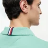 Polo de algodón liso de corte regular Polo de algodón liso de corte regular