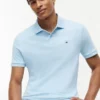 Polo de algodón liso de corte regular Polo de algodón liso de corte regular