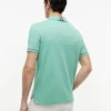 Polo de algodón liso de corte regular Polo de algodón liso de corte regular
