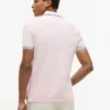 Polo de corte entallado con ribetes