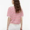 Polo de corte holgado con rayas jaspeadas