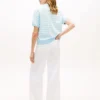 Polo de corte holgado con rayas jaspeadas