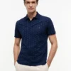 Polo de corte regular con estampado de anclas