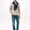 Polo de corte regular con rayas bordadas