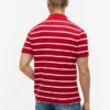 Polo de corte regular con rayas y tejido transpirable Polo de corte regular con rayas y tejido transpirable